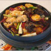 Chong Qing Hot Pot · Hot and very spicy. A dish filled with beef, chicken, lamb, pork, fish and tofu. Recommended...