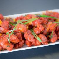 Chili  Chicken · Marinated boneless chicken pieces fried and tossed in chilli sauce with spices, onions and b...