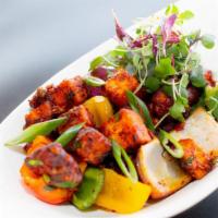 Gobi Paneer Fry · Cauliflower florets and Paneer cubes marinated with Indian spices, deep fried and tossed wit...