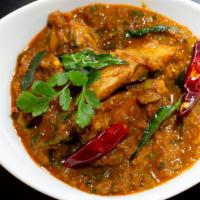 Spicy Chicken Curry · Cubes of succulent chicken cooked in a traditional brown gravy with herbs and spices. Allerg...