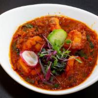 Shrimp Curry · Peeled Shrimp cooked in a curry sauce with a blend of spices and herbs