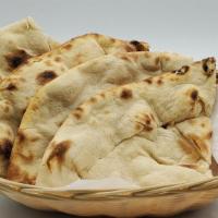 Tandoori Roti · Unleavened whole wheat flatbread baked in the oven.