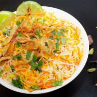 Chicken Biryani · Boneless Chicken pieces marinated, tossed in curry sauce flavored with spices and mixed with...