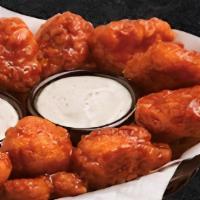 12 Boneless Wings
 · Enjoy our seasoned boneless wings tossed in your choice of sauce, or none at all, and served...