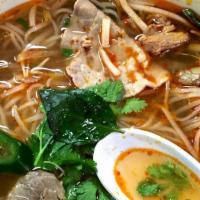 16. Hue Style Beef & Pork · Spicy. With lemongrass vermicelli noodle soup.