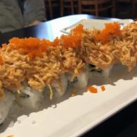 Peter's Special Roll · Shrimp tempura, cucumber wrapped with salmon, spicy crab on top, masago.