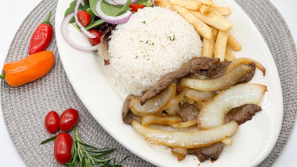 Beef with Onions / Bife Acebolado · Rice, beans, fries, tomato vinaigrette, and salad.