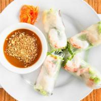Fresh Spring Rolls (2pc) · Shrimp wrapped with rice paper, lettuce, mint, bean spouts, carrots, and vermicelli noodles ...