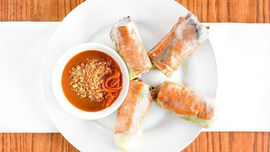 Tofu Rolls (2pc) · Marinated deep  fried tofu wrapped with rice paper, lettuce, mint, bean spouts, carrots, and vermicelli noodles served with vegetarian sauce