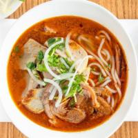 13. Beet & Pork Noodle Soup (Bun Bo Hue) · spicy lemon grass soup, well done beef, steam pork, and pork patty, Large vermicelli noodles...