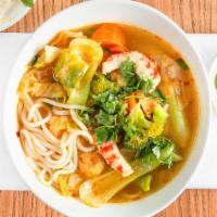 42. Veggie Spicy Noodle Soup (Bun Hue chay) · Spicy lemon grass  soup from central Vietnam with tofu, veggie ham, gluten, soy protein, car...