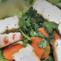42. Vegetable Rice Noodle Soup · tofu,veggie ham, deep fried tofu skin, carrot, broccoli, Shanghai Bok Choy.,cabbage served w...