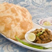 Street Style Chole Bhature · Fiery curried chickpeas and puffy fried white flour bread.