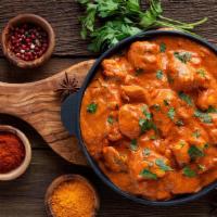 World Famous Chicken Tikka Masala · Gluten-free. Breast chicken barbecue in tandoor and then cooked in a rich tomato and onion s...