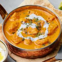 Creamy Butter Chicken Curry · Chunks of grilled chicken cooked in a smooth buttery and creamy tomato-based gravy.