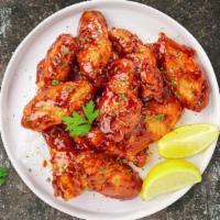 Hot Shot Honey BBQ Wings · Fresh chicken fried until golden brown, and tossed in hot honey barbecue sauce. Served with ...