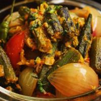 Bhindi-do-pyaza · Crispy fried okra seasoned with diced onions, tomatoes and spices.