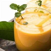 Mango Lassi · Refreshing yogurt drink blended with mango pulp.