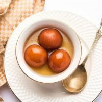Gulab Jamun (Pair) · Most popular Indian sweet. Juicy sweet fried balls dipped in a cardamom-flavored sugar syrup.