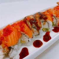 Sf Giant Roll · In: Real crab & Avocado Out:  Salmon, Unagi, Eel sauce & Tobiko