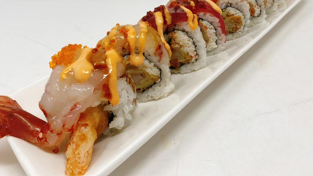 A's Special Roll · In:  Tempura Shrimp, Real crab, Cucumber Top: Tuna, Salmon, Hamachi & Ama-Ebi with chef special sauce