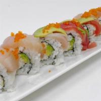 Rainbow Roll · In : Real crab & Avocado Out:  Assorted fishes & Tobiko