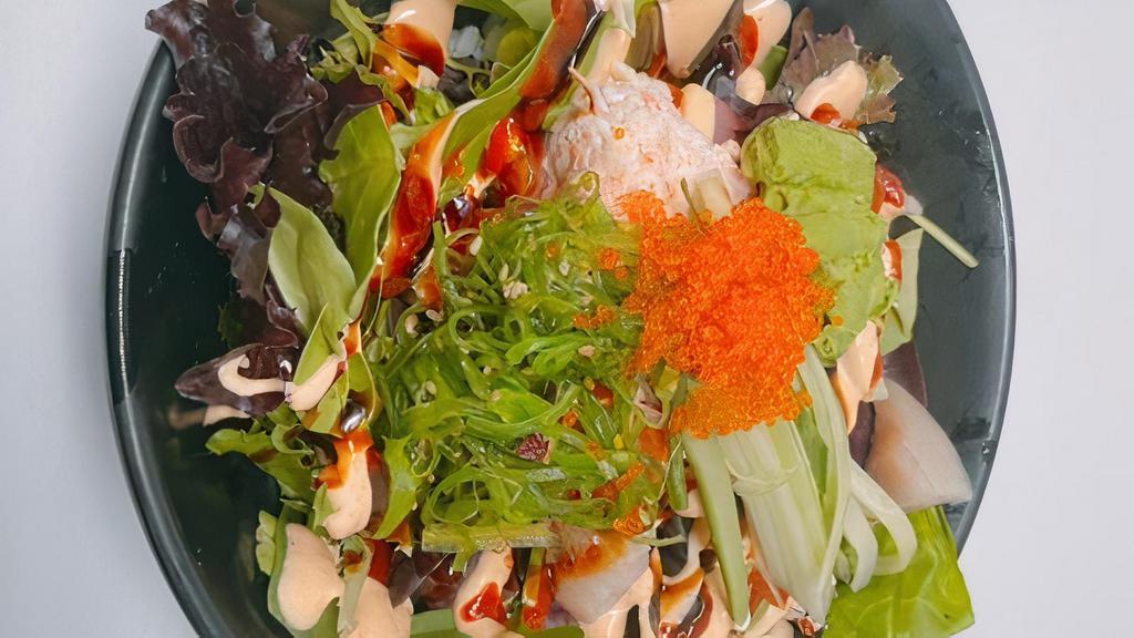 Mixed Poke Bowl · Tuna, salmon, Hamachi, Real crab, Avocado, cucumber, seaweed salad, tobiko, sushi rice and spring mix