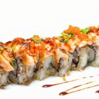 Lion King (Baked) · In: California roll. Out: salmon, tobiko, green onion with unagi sauce.