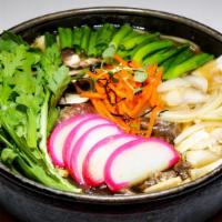 Beef Sukiyaki · Ribeye, tofu, vegetables, fish cake stew.
