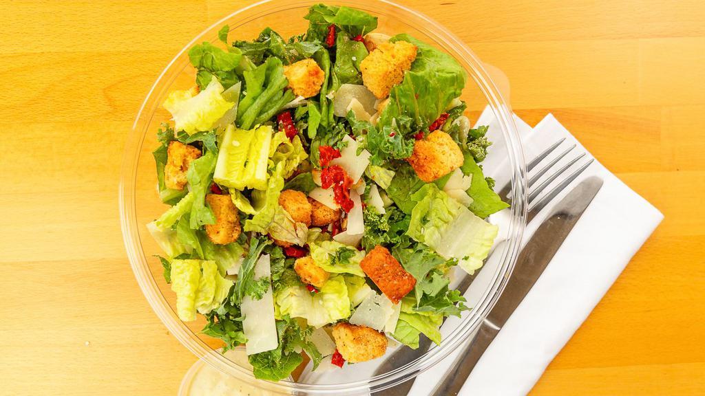 Toss Caesar · Chopped romaine, shredded kale, sun-dried tomatoes, roasted garlic cloves, focaccia crouton,  
*caesar dressing

ONLY TWO SUBSTITUTIONS WILL BE HONORED