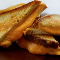 Grilled Cheese · american cheese on sourdough bread