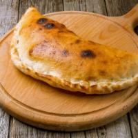 Spicy Meat Calzone · A spicy blend of cheese, sauce and meat inside the calzone. With a choice of cheese and meat...