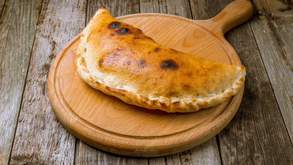 Spicy Meat Calzone · A spicy blend of cheese, sauce and meat inside the calzone. With a choice of cheese and meat required.