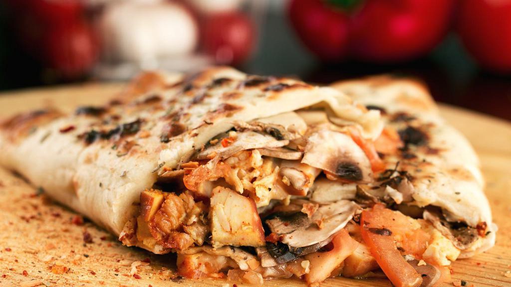BBQ Chicken Calzone · Pan baked thick pizza layered with barbecue chicken and fresh mozzarella cheese.