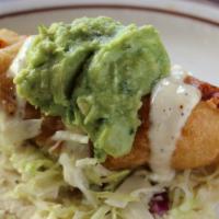 *Baja Fish Taco · Beer Battered Local Cod, Cabbage Slaw, Roasted Ancho Salsa, & Baja Lime Sauce