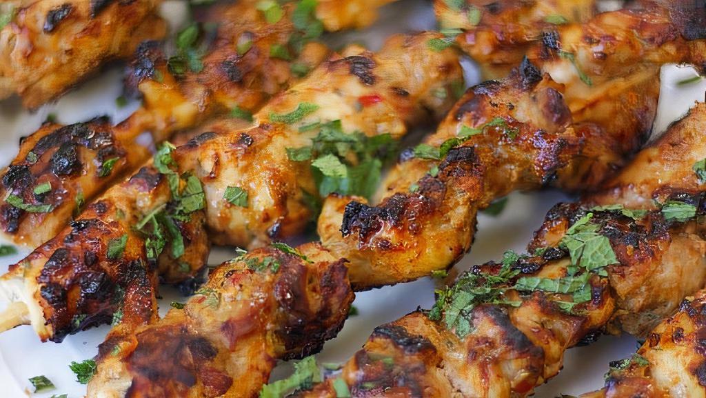 1. Chicken Kabob · Boneless skinless marinated chicken with spices cooked over a grill.