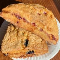 Scone · Try one of our Apricot, Blueberry, or Raspberry scones for a delectable delight!