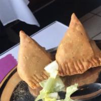 Vegetable Samosa (2pc) · Vegetarian. Peas and potatoes wrapped in our home style samosa bread and deep fried.
