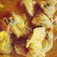 Chicken Curry · Tender chicken pieces cooked with homemade curry of tomatoes, onions, ginger and garlic.