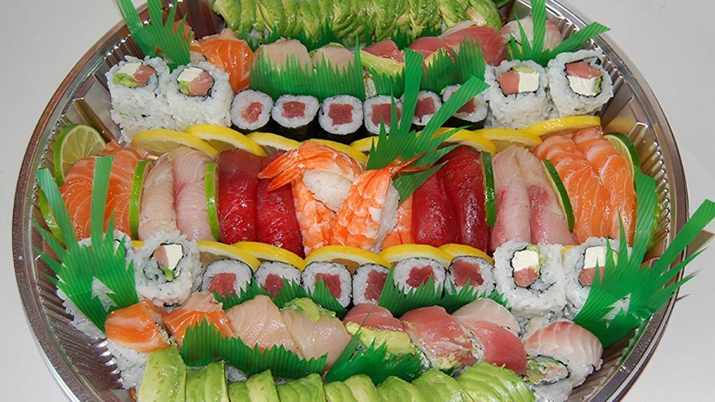 Nigiri & Rolls · 16 pieces of Caterpillar Roll, 16 pieces of Rainbow Roll, 16 pieces of Philadelphia Roll, 12 pieces of Tekka Maki, 16 pieces of Salmon, Tuna, Yellowtail and Cooked Shrimp Nigiri
