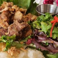 Fried Marinated pork ( Moo – Todd ) · Deep fried Marinated pork with special sauce top with fried onion serve with sticky rice and...