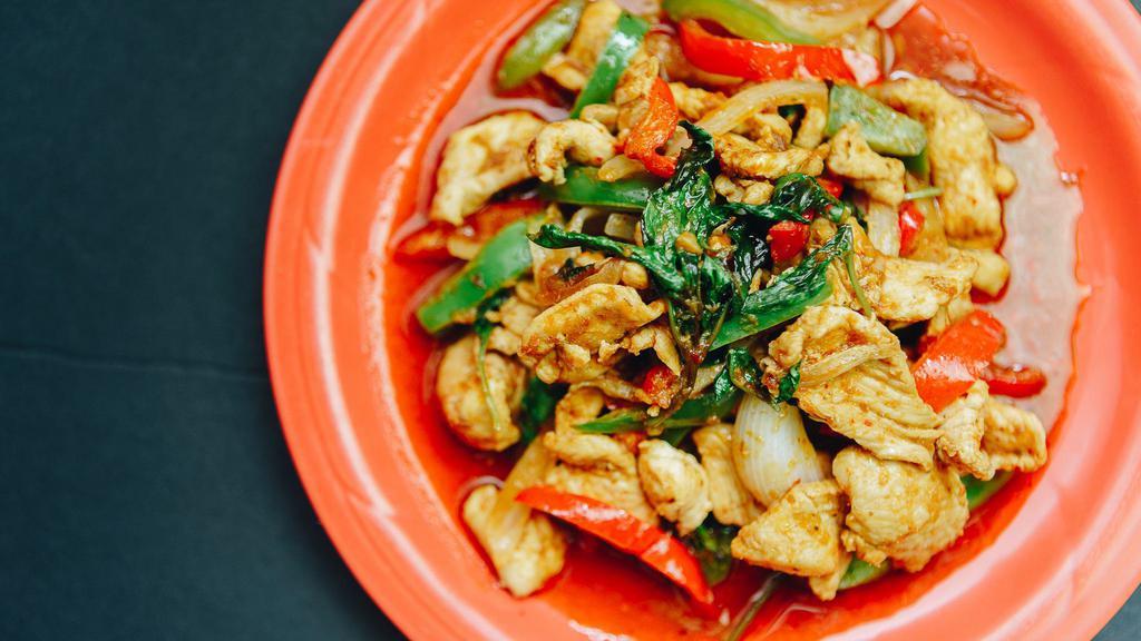 Spicy Basil · Sauteed dish with Thai chilies, onions, bell peppers, and fresh basil.
