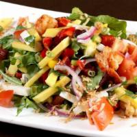Yam Ma Meung (Mango Salad) · Mango salad. Diced mango, cashew nuts, tomatoes, red onions, green onions, cilantro, lemon j...