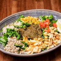 Tea Leaf Salad · Not available without peanut oil. Served with textures from fried garlic, peanuts, sunflower...
