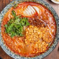 Moh Hinga Soup(Catfish Chowder Noodle Soup)(LARGE) · Fish chowder with rice noodles, ground catfish, onions, cilantro, lemon & topped with chili.