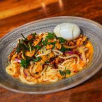 Nan Gyi Dok · Chicken coconut rice noodle. Not available vegetarian. Rice noodles with a chicken coconut s...