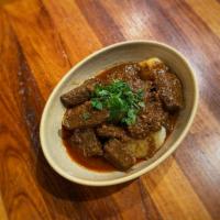 Burmese Style Curry-BEEF · Burma superstar's special curry. Braised beef until tender with potatoes and topped with cil...