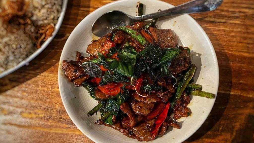Fiery Beef · Stir fried with string beans, red bell pepper and basil, in our 5 spice-sweet heat sauce.