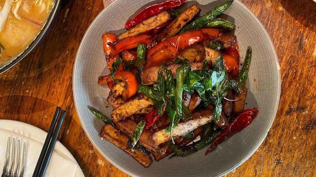 Fiery Tofu · Stir fried string beans, red bell peppers, tofu and basil in our 5 spice - sweet heat sauce.