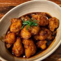 Firecracker Cauliflower · Spicy, crispy cauliflower in a tangy, garlicky sweet chili sauce. A specialty from B Star!
